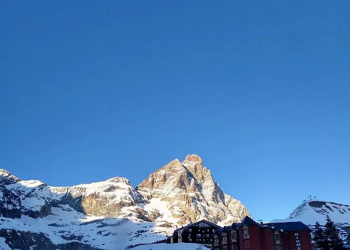 Апартаменты Alpine Glow - Sophisticated In - Out Брей-Червиния